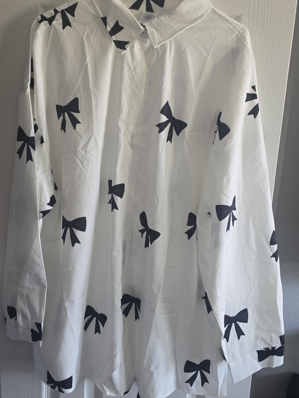 SHEIN White Shirt with Black Bow Print